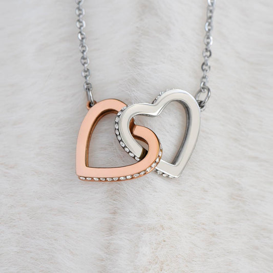 Give your daughter the gift that symbolizes your never-ending love - this  Interlocking hearts necklace with two  hearts embellished with cubic zirconia crystals - The perfect little gift of love